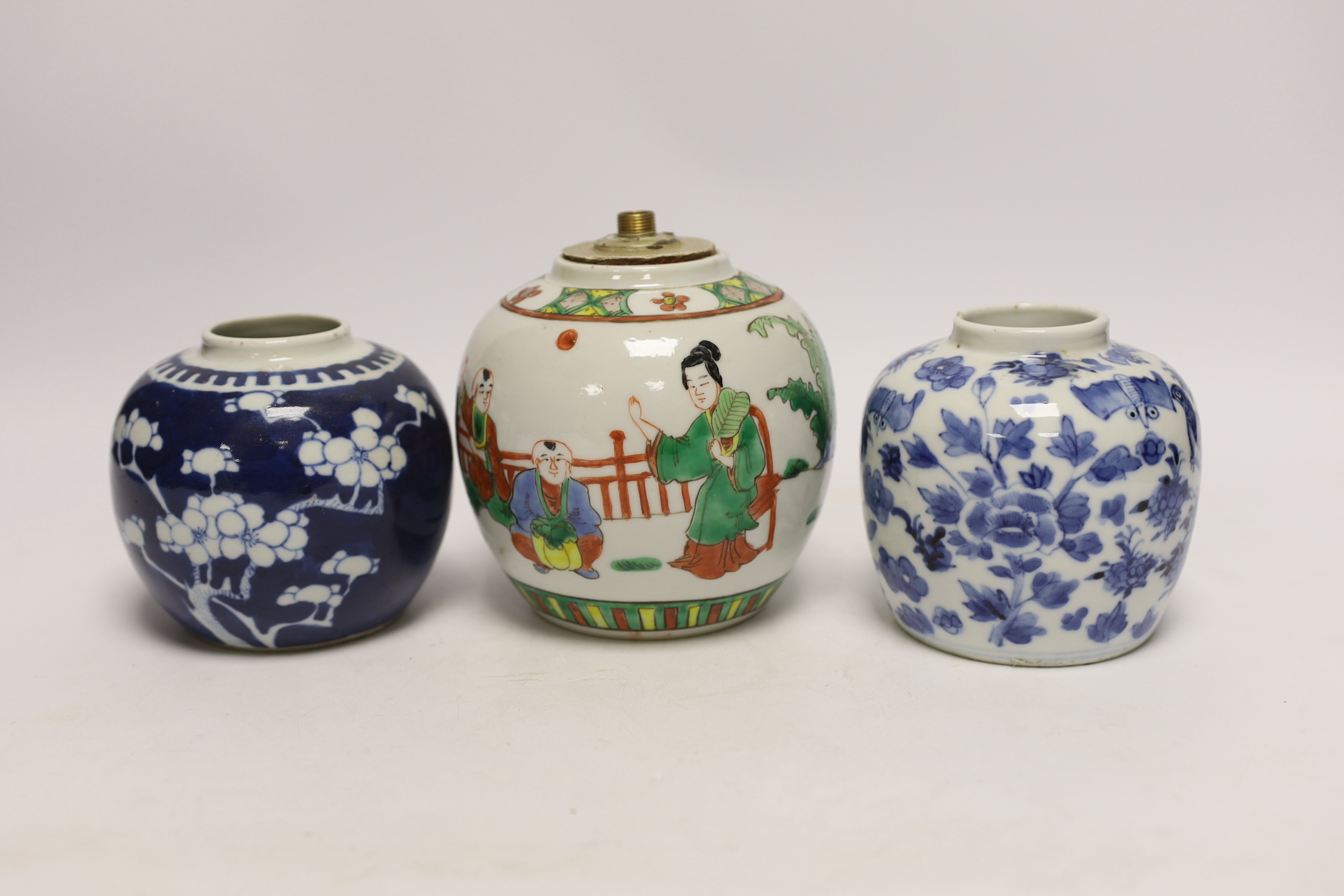 Three Chinese ginger jars, including a blue and white prunus example, Late 19th/early 20th century, largest 13cm high